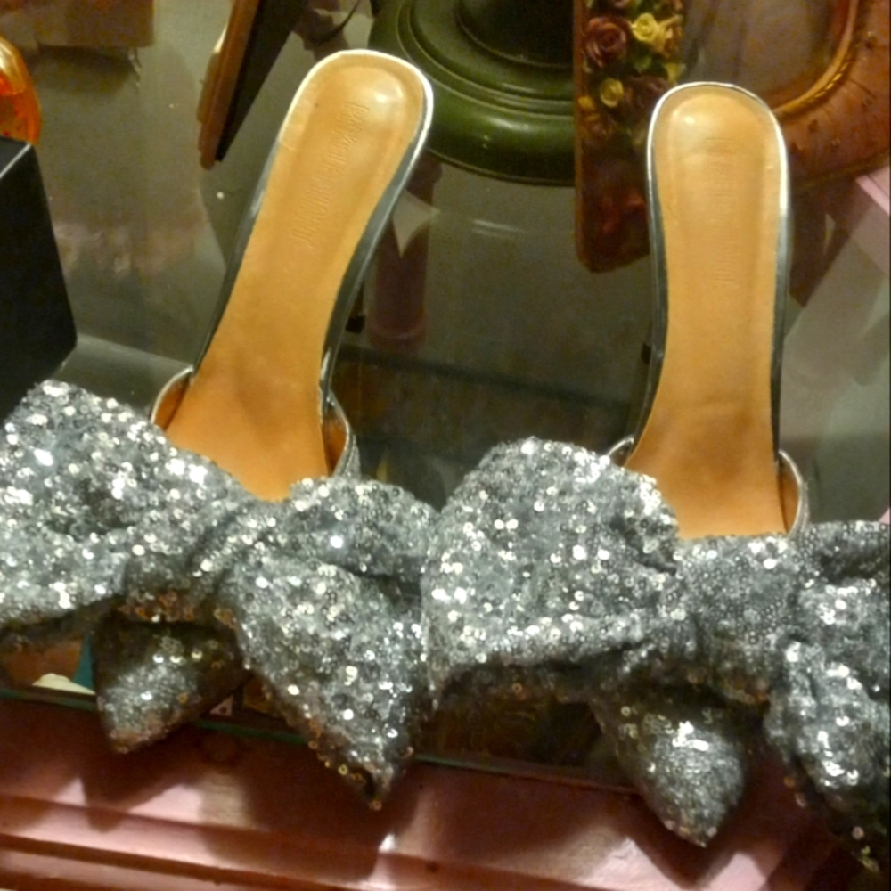 Iconic silver sequin bow mule heels